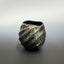 Carbonized twist lock cup