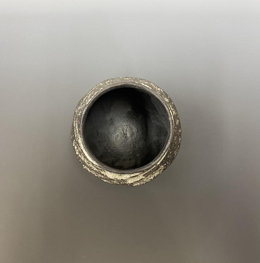 Carbonized twist lock cup