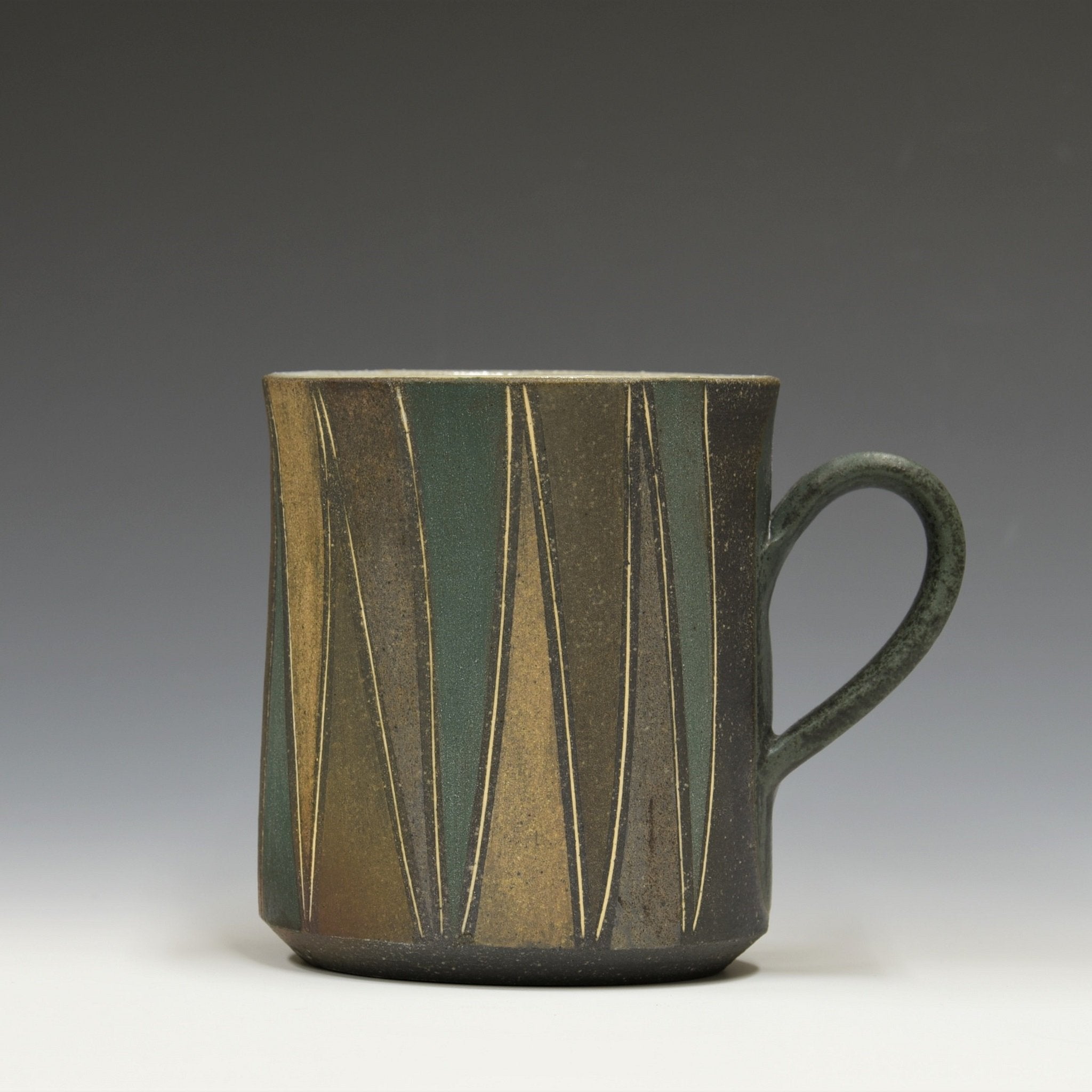 Tasse à incrustation de lignes